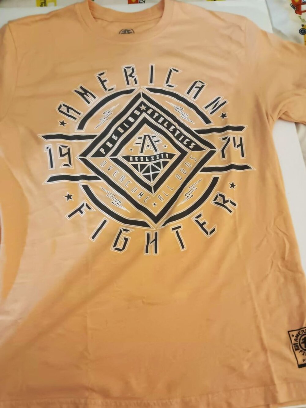 American Fighter, size L 50/50 peach short sleeved Tee.